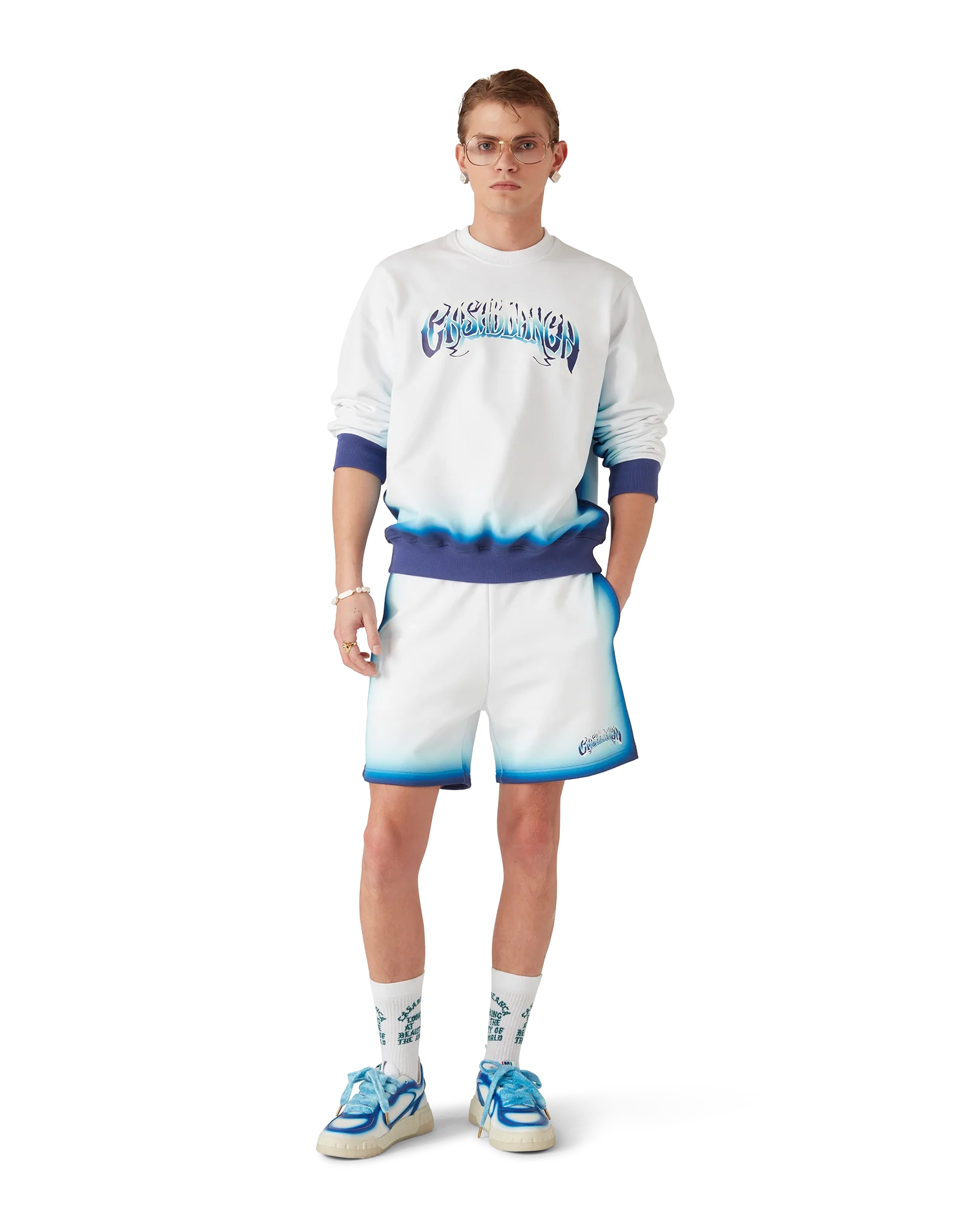 Pantalones cortos deportivos azules descoloridos
